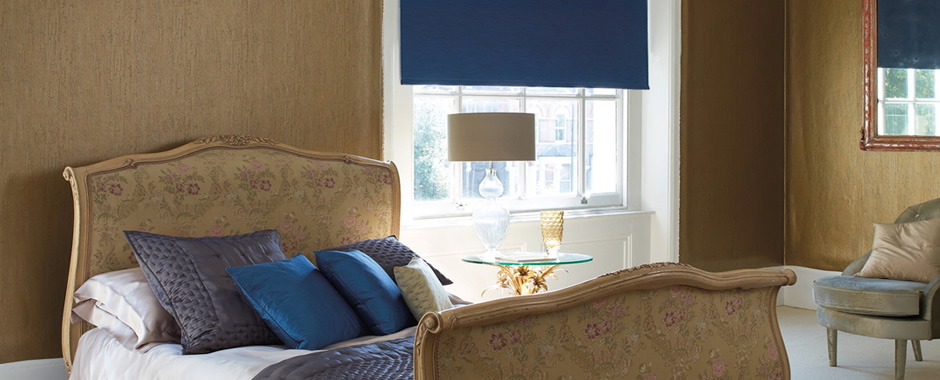 Blue blackout blinds in luxury bedroom