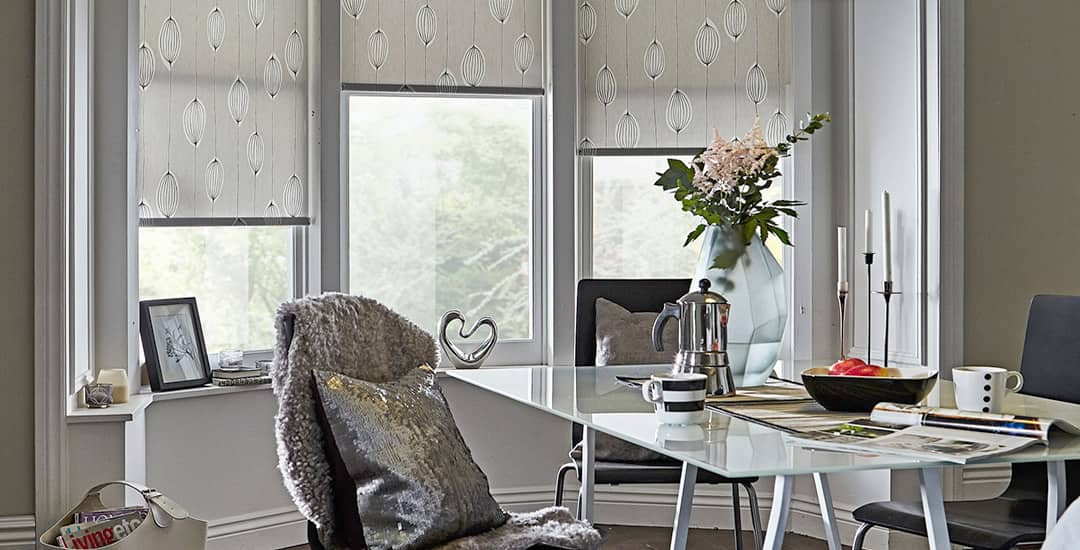 Patterned Roller Blinds In Three Sided Bay Window 