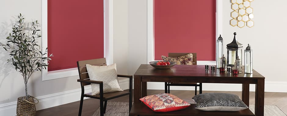 Red blackout blinds in dining room