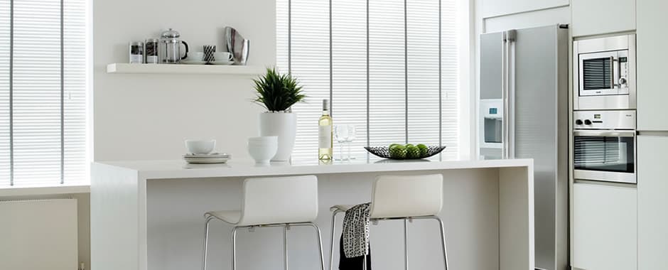 White wooden blinds with grey tapes in contemporary kitchen