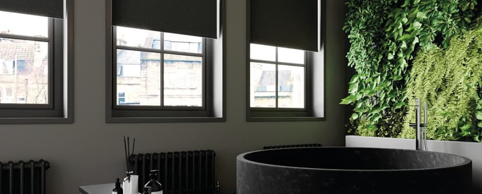 Black waterproof pvc roller blinds in large luxury bathroom