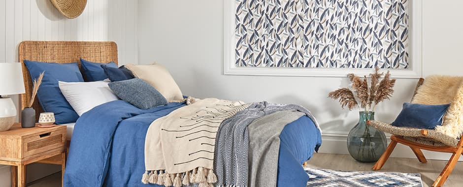 Colourful leaf patterned blackout vertical blinds in bedroom