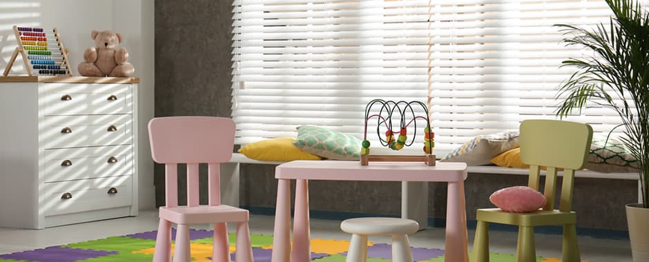 Faux wood blinds in kids’ playroom