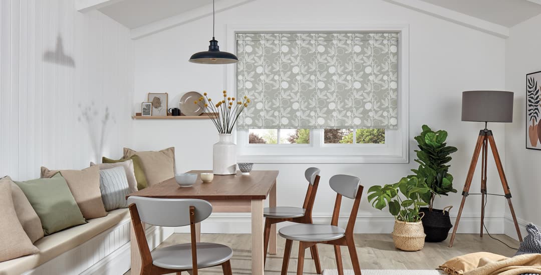 Contemporary grey floral roller blinds in grey dining room