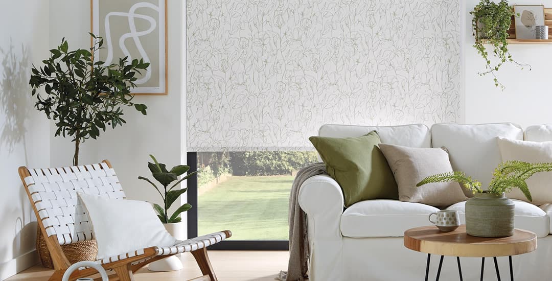 Green and white sweet peas stem patterned roller blinds in lounge