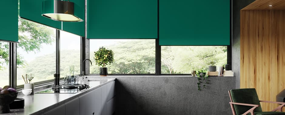 Green roller blinds in luxury modern kitchen