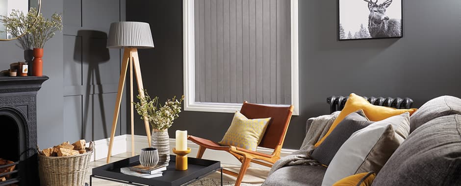 Grey vertical blinds in cosy living room