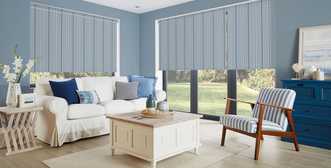 Blue striped roller blinds open at lounge windows