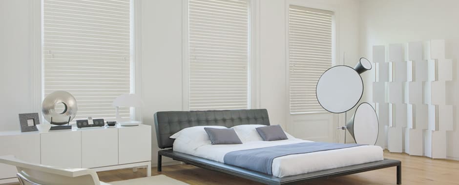 High quality cream faux wood blinds in bedroom