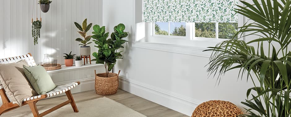 Wood themed room with green floral roller blinds