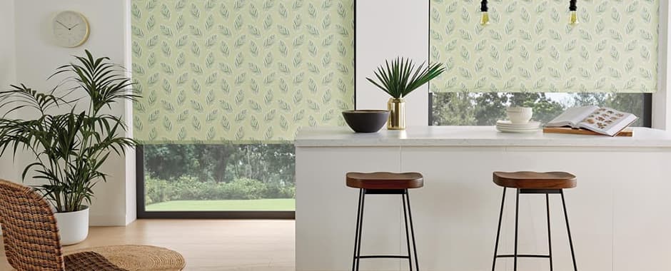 Green fern patterned roller blinds in kitchen