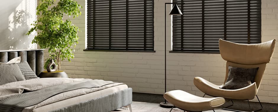 Luxury dark wooden blinds in bedroom