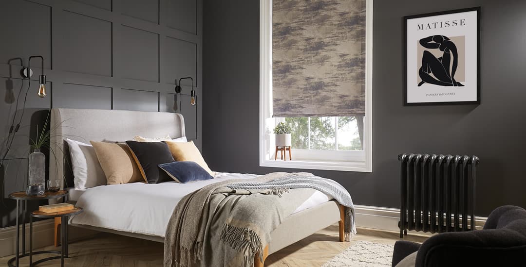 Luxury metallic textured roller blinds in a sumptuous bedroom