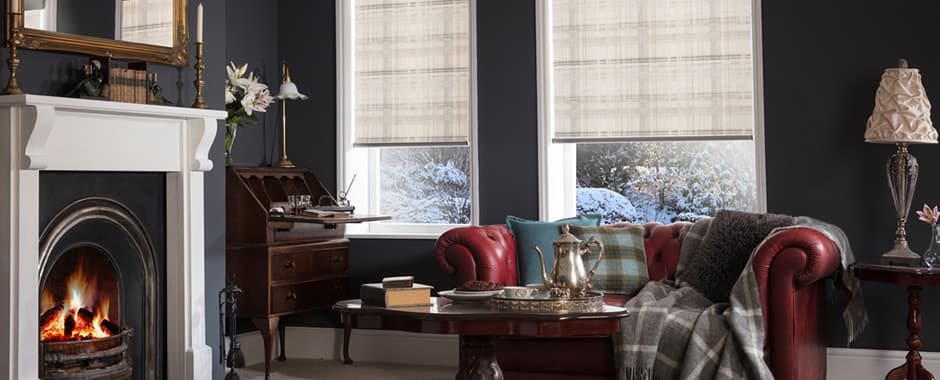 Beige patterned roller blinds in a traditional drawing room